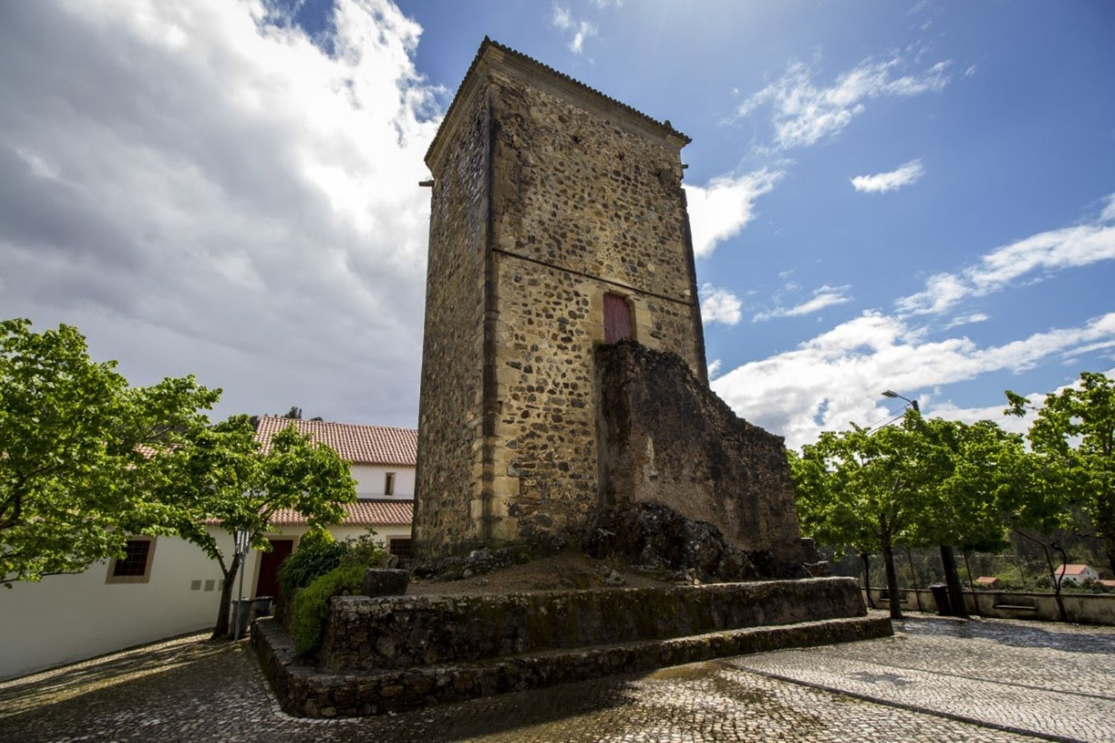 Templar Tower framed in the churchyard of the Sanctuary of Our Lady of Pranto